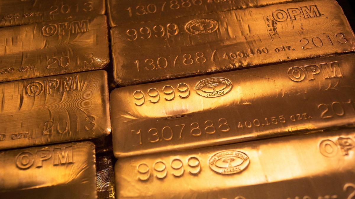 Gold edges higher from over one-and-a-half-month low but higher yields cap gains